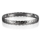 Sterling silver bangle engraved with plumeria flower and maile leaf.