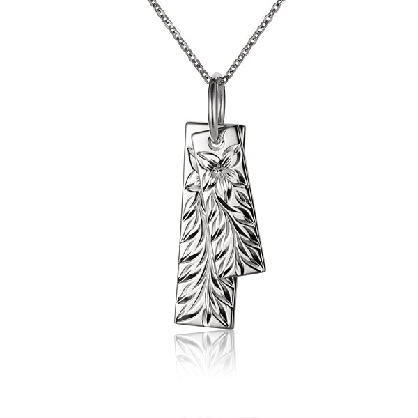 The photo shows a sterling silver double plate maile pendant.