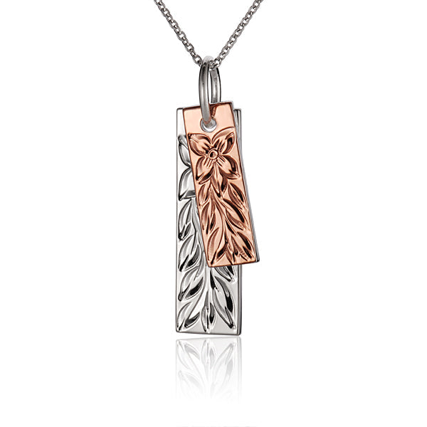 The photo shows a two-tone white and rose gold vermeil double plate maile pendant.