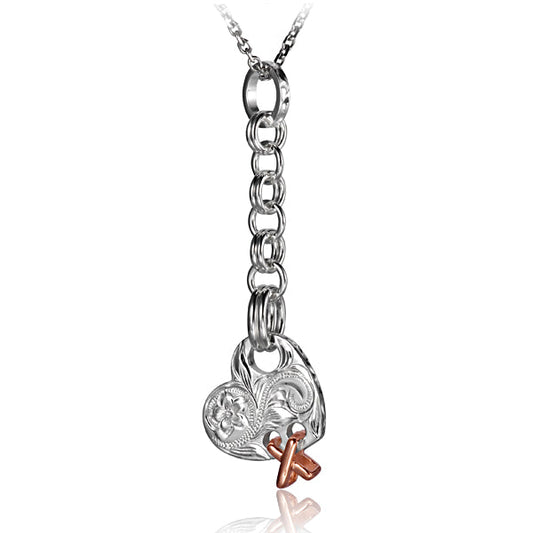 The picture is a sterling silver two-tone rose gold vermeil heart pendant with a plumeria scroll motif and a chain.