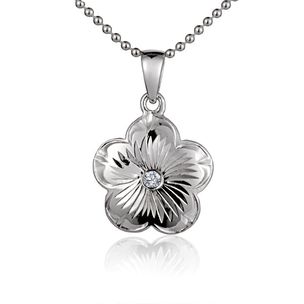 The photo shows a sterling silver espiral flower pendant with cubic zirconia.