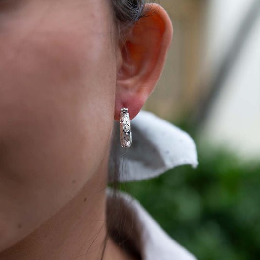 Boucles d'oreilles à volutes demi-cercle