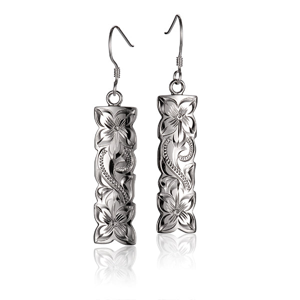 The photo shows a sterling silver pair of 10mm vertical hook earrings featuring a plumeria design.
