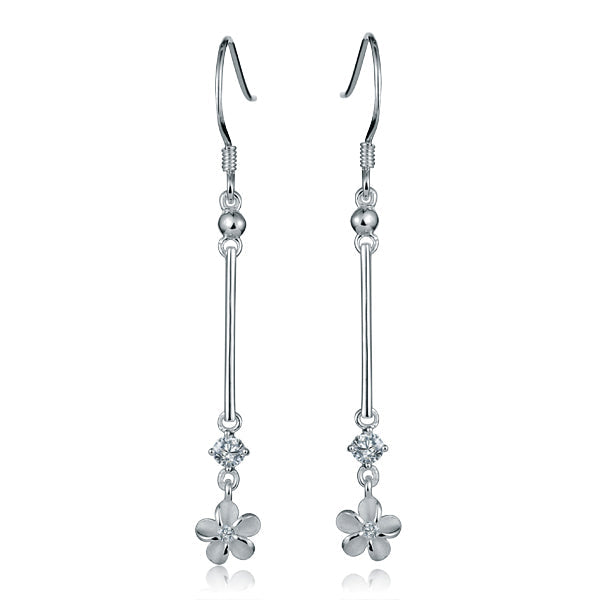 The photo shows a pair of sterling silver dangle bar earrings featuring a plumeria design with cubic zirconia.
