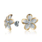 The photo is a pair of yellow gold vermeil sterling silver rhodium plated plumeria flower stud earrings with cubic zirconia gemstones.