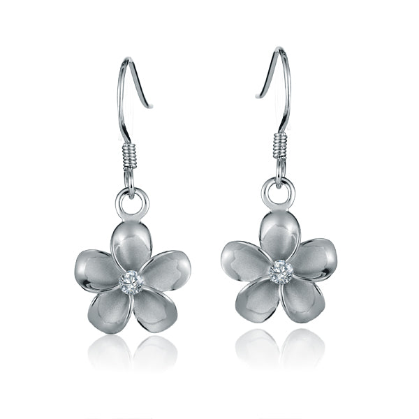 The photo show white sterling silver rhodium plated plumeria hook earrings with cubic zirconia stones. 