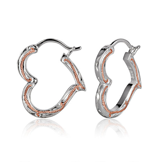 The picture show two-tone white and rose gold vermeil heart outline hook earrings with scroll engraving.