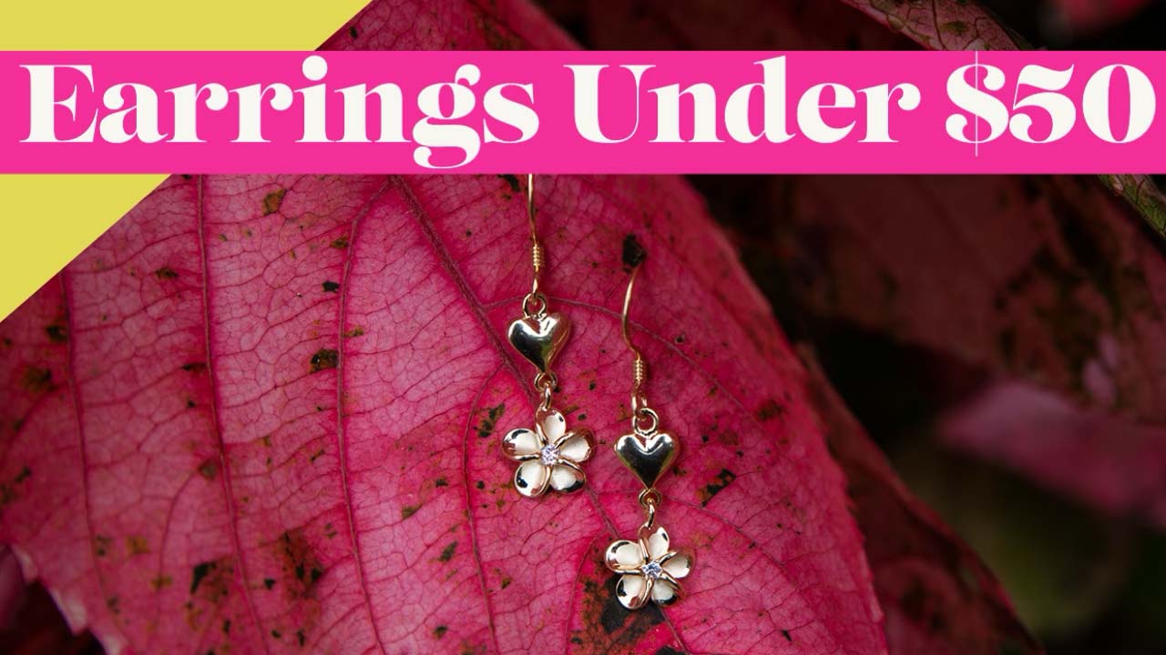 Earrings under 50 featuring gold vermeil hook earrings with heart and plumeria flower