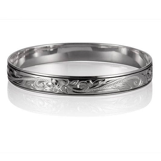 The photo shows a sterling silver scroll flower bangle. 