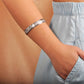 Bracelet à bordure noire Plumeria Scroll