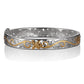 The photo is a sterling silver yellow gold vermeil plumeria scroll bangle.