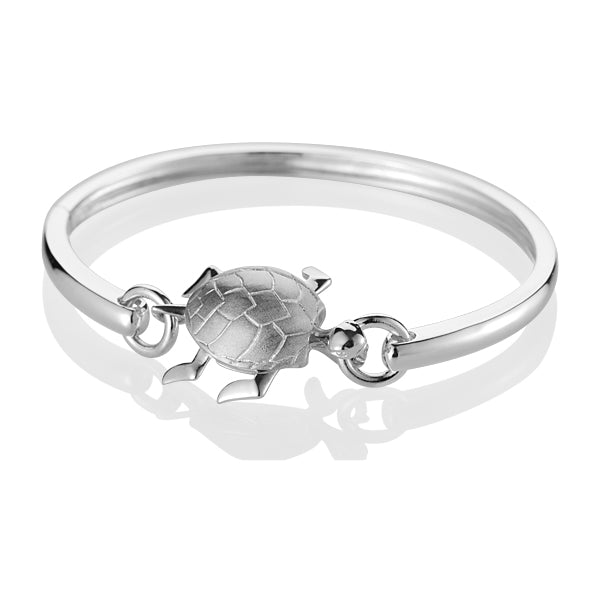 The photo shows a sterling silver sea turtle bangle with a moving open design.