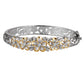 The picture has a two-tone yellow gold vermeil sterling silver rhodium plated flower bangle with cubic zirconia gems. 