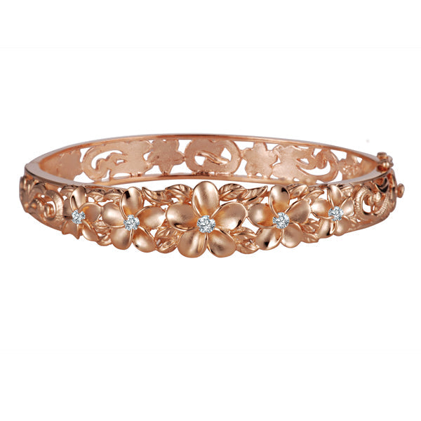 The picture is a rhodium plated rose gold vermeil plumeria bangle with cubic zirconia. 