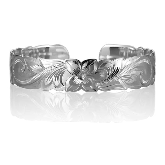 The picture shows a 15 mm sterling silver scroll cuff bangle.