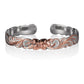 The picture is a two-tone sterling silver rose gold vermeil cuff bangle with a flower scroll motif. 
