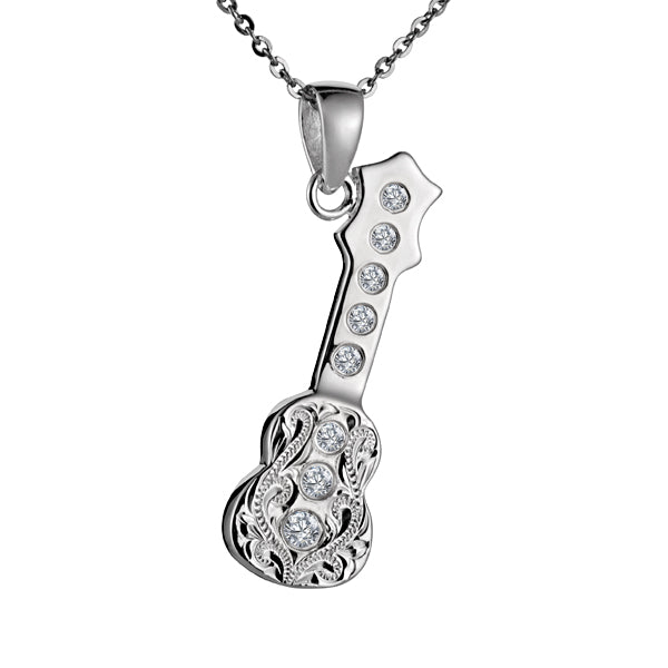 The photo shows a sterling silver cubic zirconia ukulele pendant. 