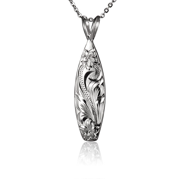 The photo shows a sterling silver surfboard pendant with a plumeria scroll engrave. 