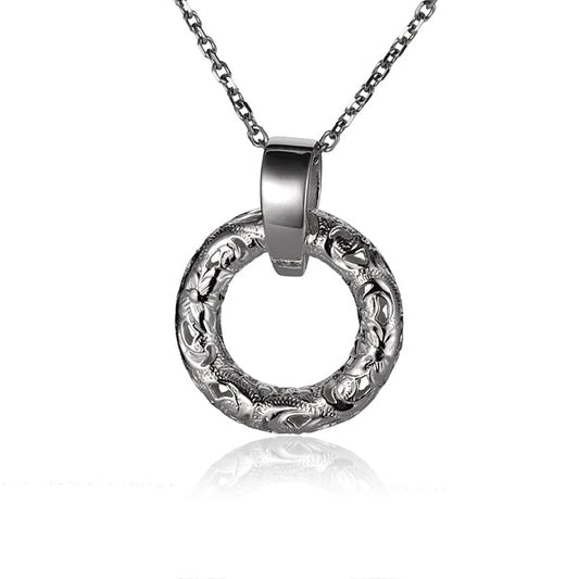 The photo shows a sterling silver circle pendant with a plumeria scroll design. 