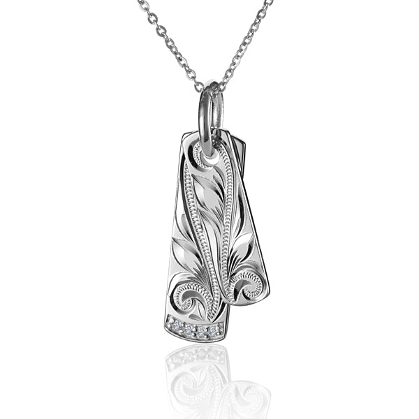 The photo shows a sterling silver double bar pendant with a scroll design with cubic zirconia.