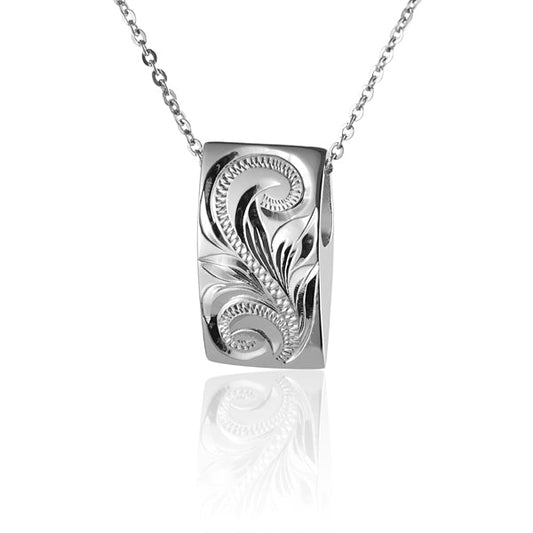 The photo shows a sterling silver scroll plate oval face pendant.