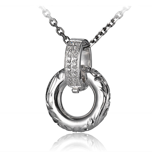 The photo is a sterling silver round circle bell pendant with cubic zirconia.