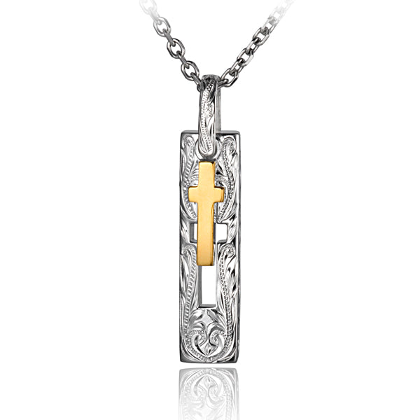 The photos shows a two-tone gold vermeil hollow cross pendant.