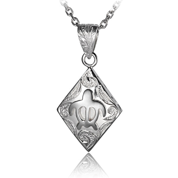 The photo shows a sterling silver diamond shape pendant featuring a sea turtle design. 