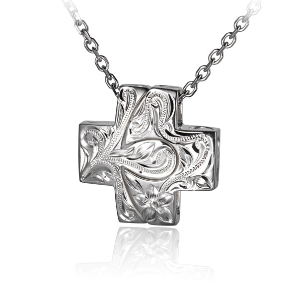 The photo shows a sterling silver pendant featuring a Hawaiian scroll design. 