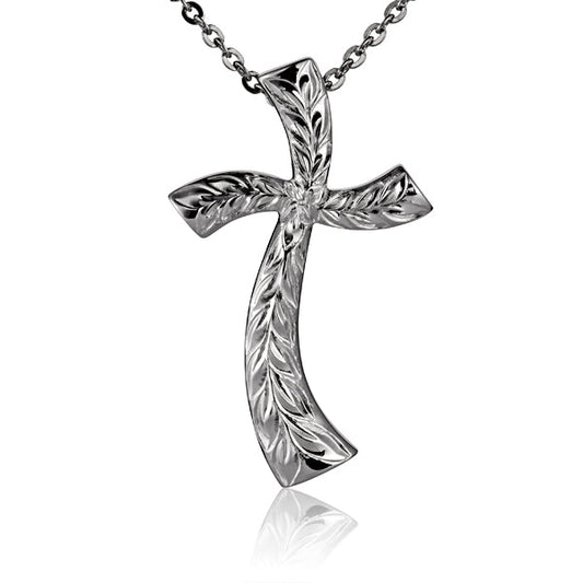 The photo shows a sterling silver cross pendant featuring a maile leaf motif engraving.