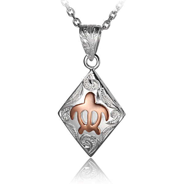 The photo shows a sterling silver and rose gold vermeil diamond shape pendant featuring a sea turtle design. 