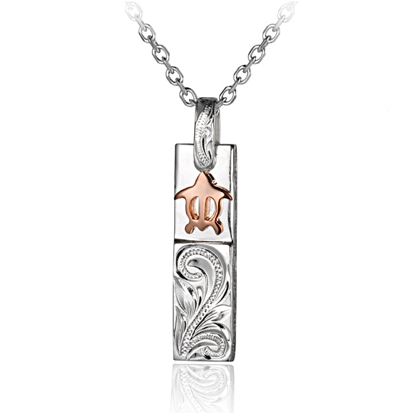 The picture shows a two-tone white and rose gold vermeil scroll bar sea turtle pendant.