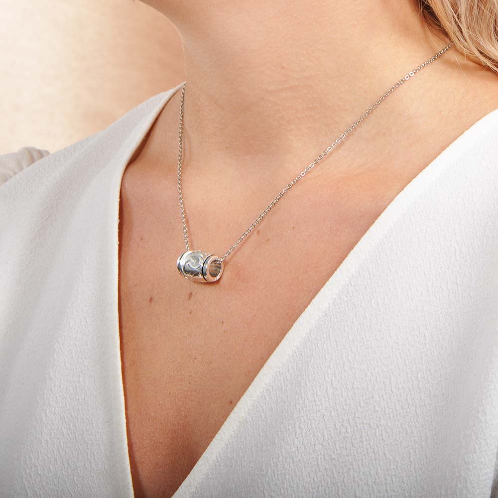 The picture is a sterling silver barrel pendant.