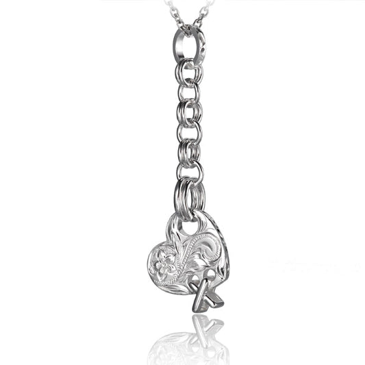 The photo shows a sterling silver heart pendant with a plumeria scroll motif and a chain. 