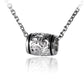 The picture shows a sterling silver engraving barrel pendant in a medium size. 