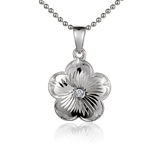 The photo shows a sterling silver espiral flower pendant with cubic zirconia. 
