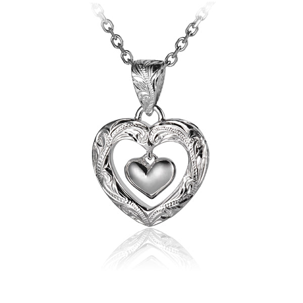The photo is a sterling silver engraved heart pendant featuring a dangling heart motif.
