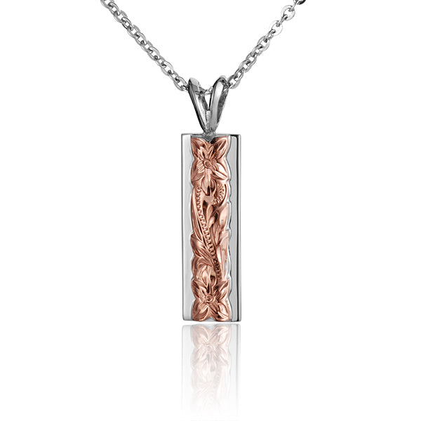 The picture shows a two-tone rose gold vermeil sterling silver plumeria scroll bar pendant. 