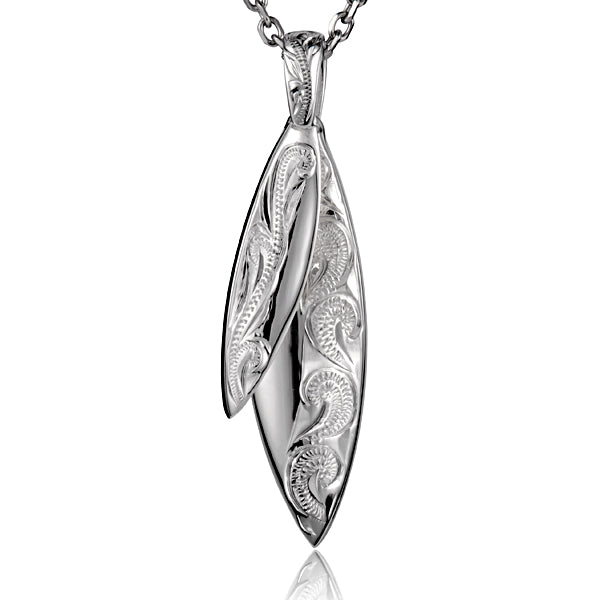 The picture shows a white gold vermeil scroll double surfboard pendant. 