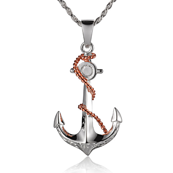 The photo shows a sterling silver and rose gold vermeil rope and anchor pendant. 