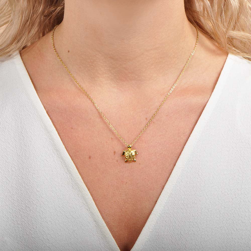 Pendentif tortue de mer Destiny Scroll