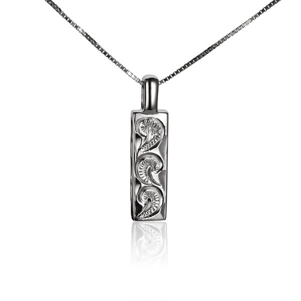 The picture shows a sterling silver Hawaiian wave scroll pendant.