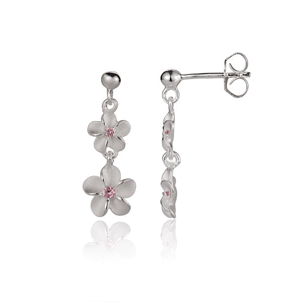 The photo is a pair of bead dangling double plumerias matte stud earrings with pink cubic zirconia. 