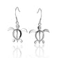 The picture has a pair of sterling silver sea turtle hook earrings. 