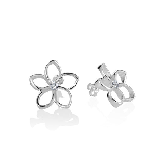 The photo shows a pair of plumeria stud earrings made in sterling silver with a cubic zirconia gem.