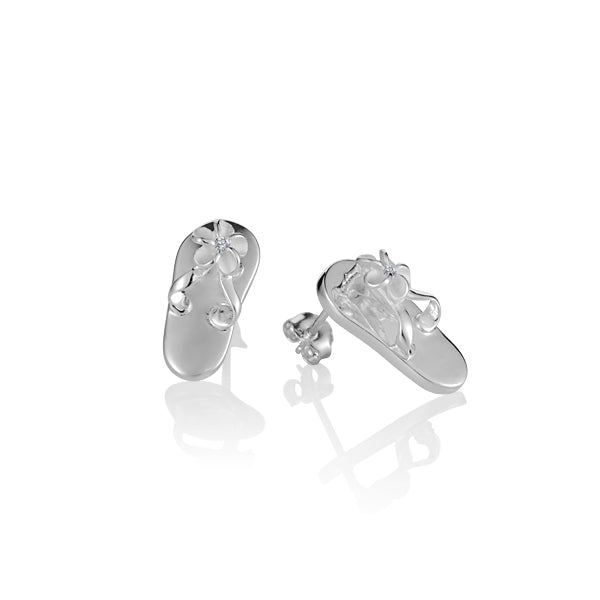 The photo show sterling silver slipper stud earrings featuring a flower with cubic zirconia. 
