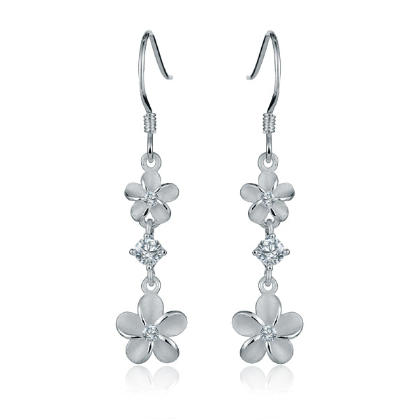 The photo shows a pair of sterling silver 2 plumeria hook earrings with cubic zirconia gems. 