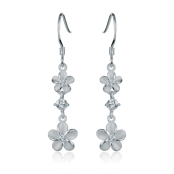 The photo shows a pair of sterling silver 2 plumeria hook earrings with cubic zirconia gems. 