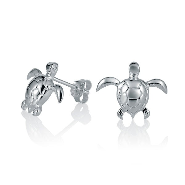 The photo shows a pair of sea turtle sterling silver stud earrings. 