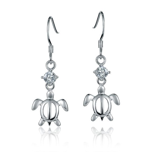 The photo shows a pair of sterling silver cubic zirconia sea turtle dangle hook earrings.